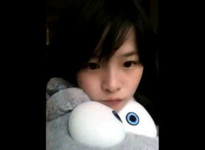 Uber-cute asian maiden dancing on web